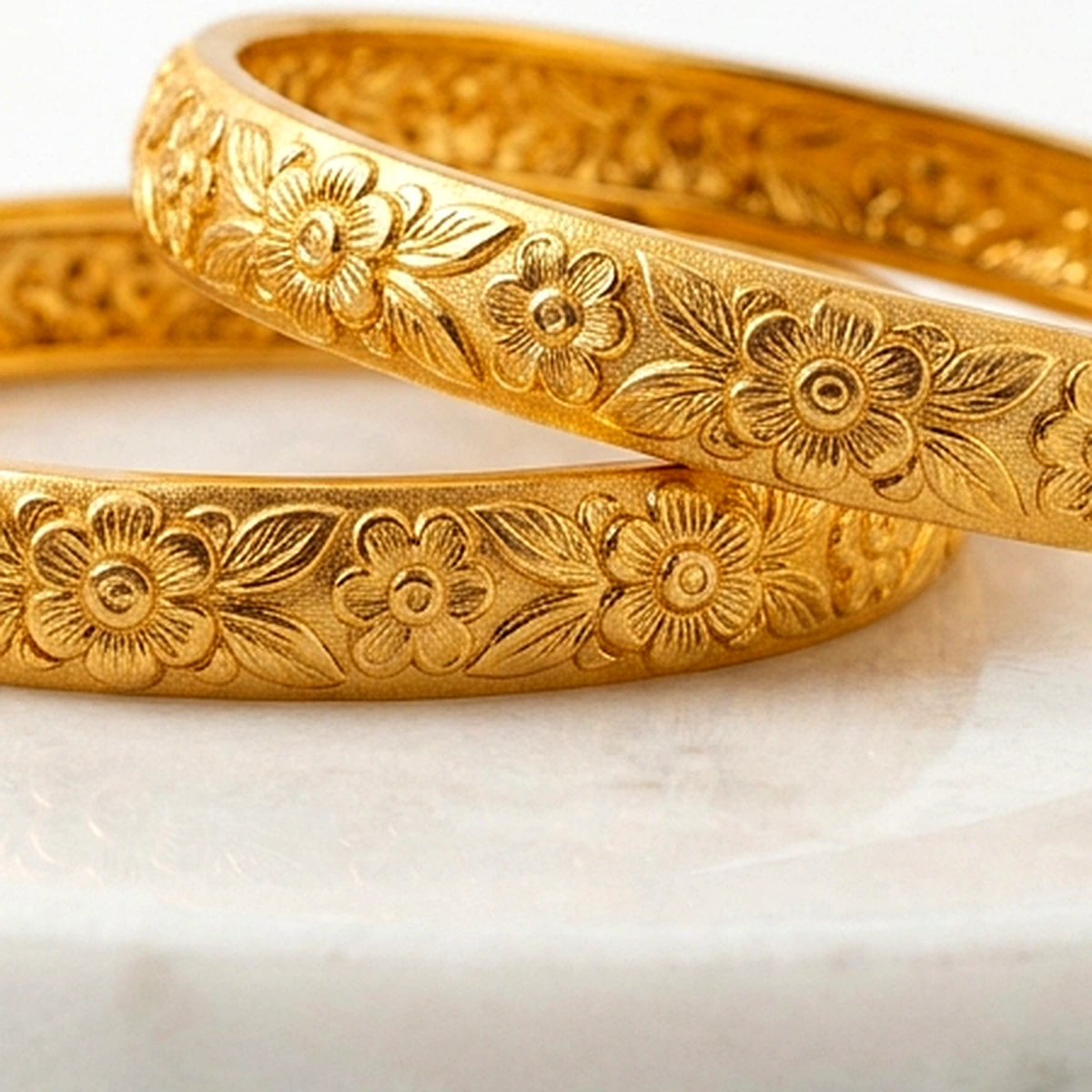 1-Gram Micro Gold Embossed Floral Bangles (Pair of 2) - Macro Craftsmanship Detail View
