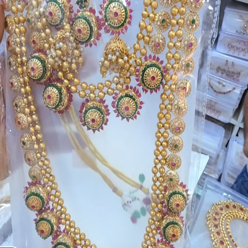 Royal 1-Gram Gold Plated Kemp Ruby & Emerald Bridal Combo Set with Long Haram, Choker & Jhumkas - 45° Hero Perspective Angle